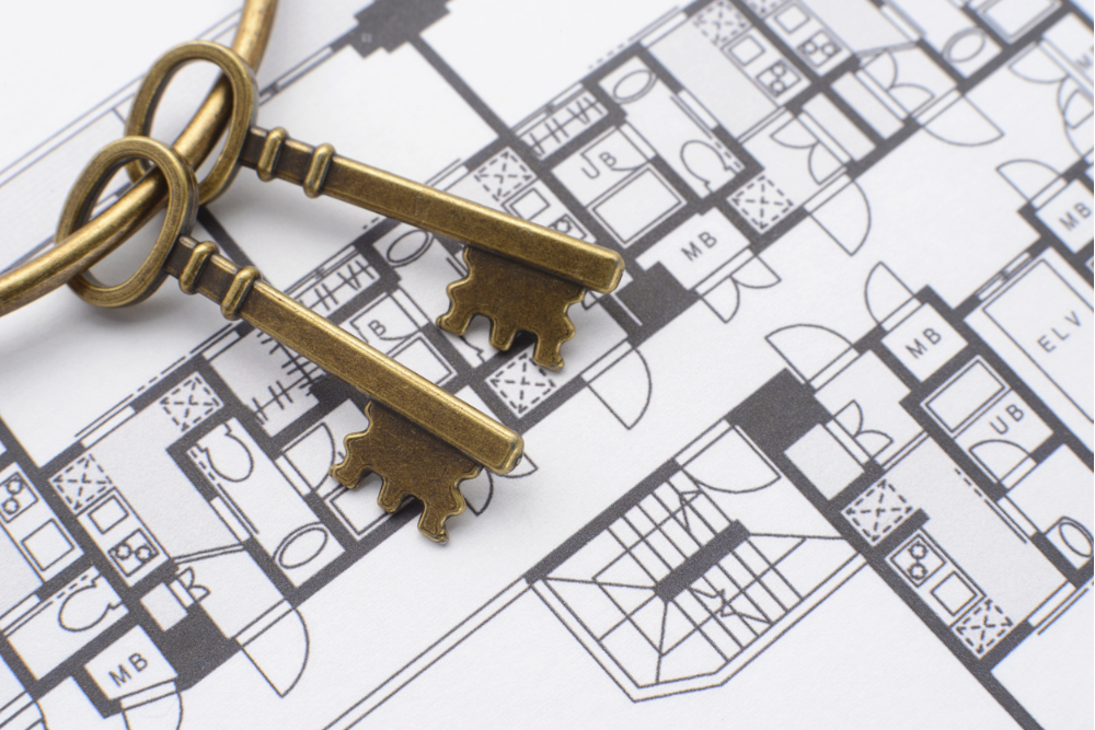 Keys placed on a home floor plan blueprint symbolizing Ottawa homes for sale in 2026 by Anna Alemi Real Estate