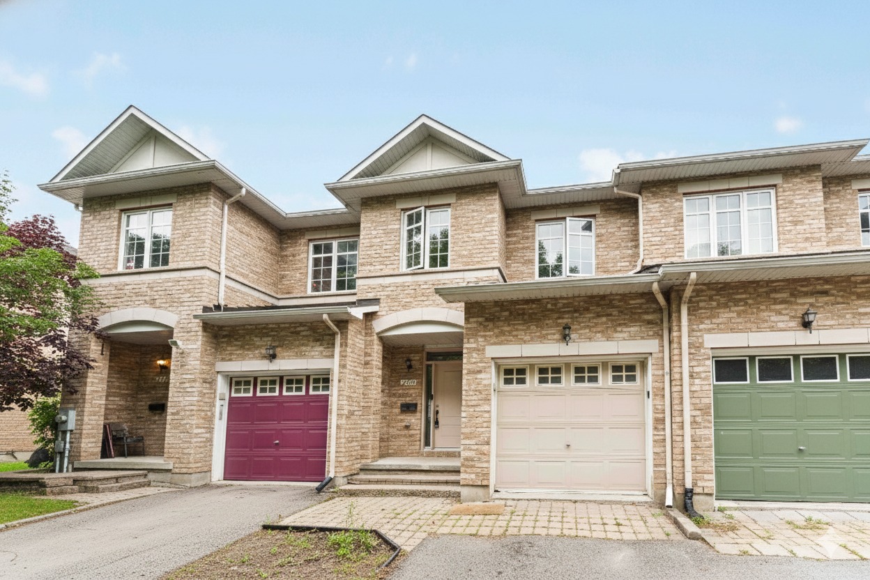 Front exterior of 270 Berrigan Drive in Barrhaven Ottawa, a family-friendly home featured by an Ottawa realtor in a quiet residential neighborhood near parks and shopping. Anna Alemi Real Estate