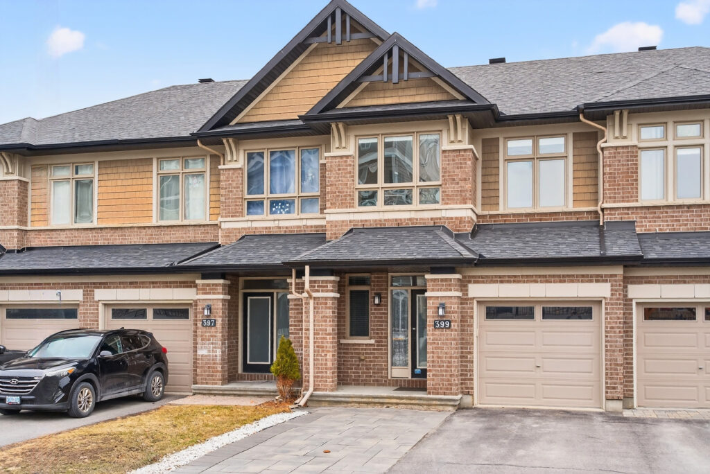 Beautifully upgraded detached home in Ottawa featuring a modern open-concept layout, hardwood floors, curved staircase, and a luxury kitchen with granite countertops and stainless steel appliances
