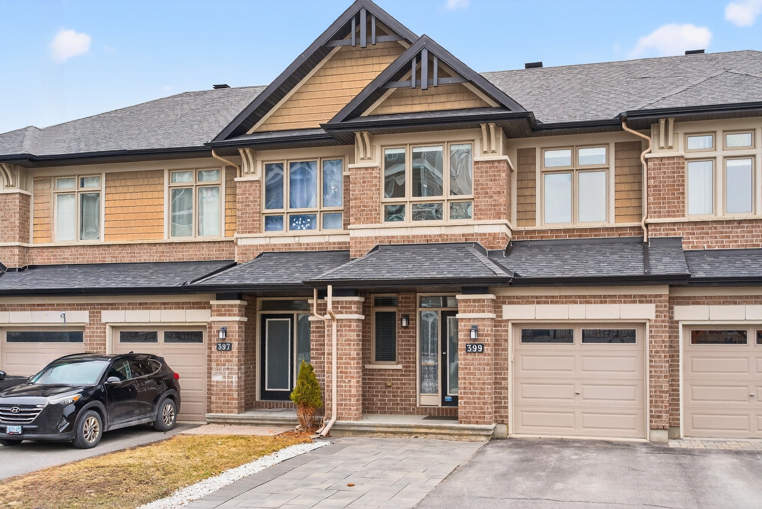 Beautifully upgraded detached home in Ottawa featuring a modern open-concept layout, hardwood floors, curved staircase, and a luxury kitchen with granite countertops and stainless steel appliances