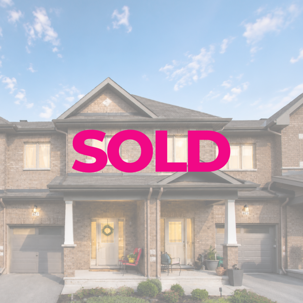 Front exterior of a modern detached family home on Via Campanale with attached garage, covered entryway, and landscaped front yard at dusk with sold sign.